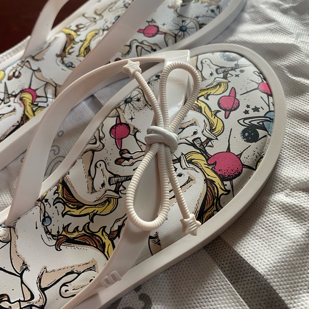 Melissa white unicorn flip flops